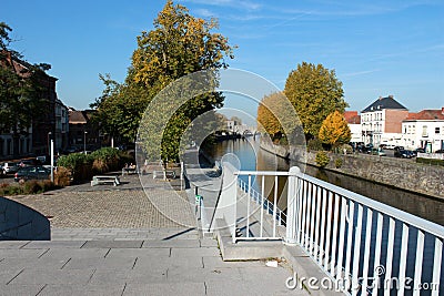 Promenade le long du quai Notre-Dame aÃƒâ€šÃ‚Â Tournai en Belgique en automne. Pont des trous en perspective Stock Photo